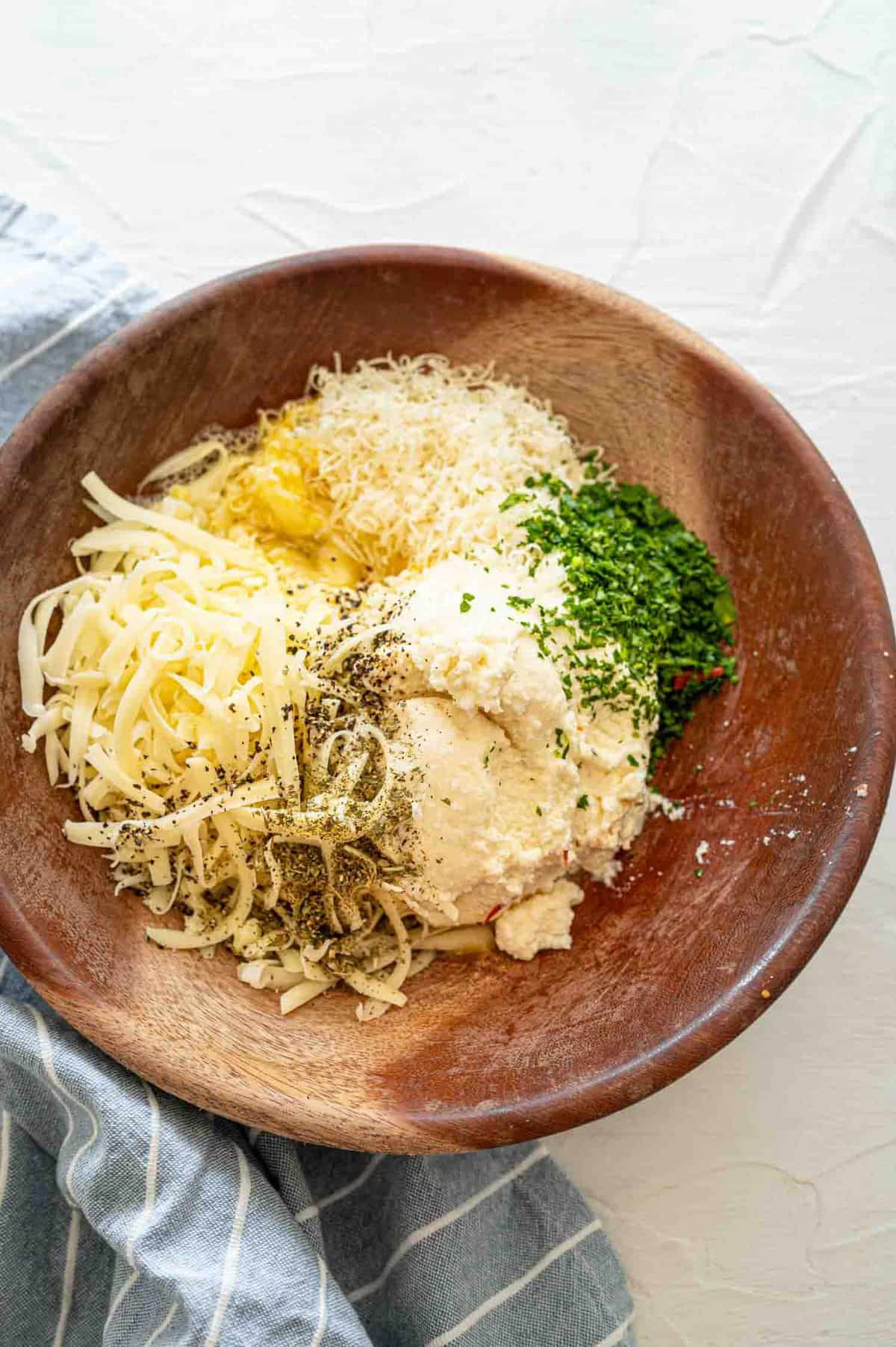 Cheese Calzone Filling ingredients pictured in a bowl.