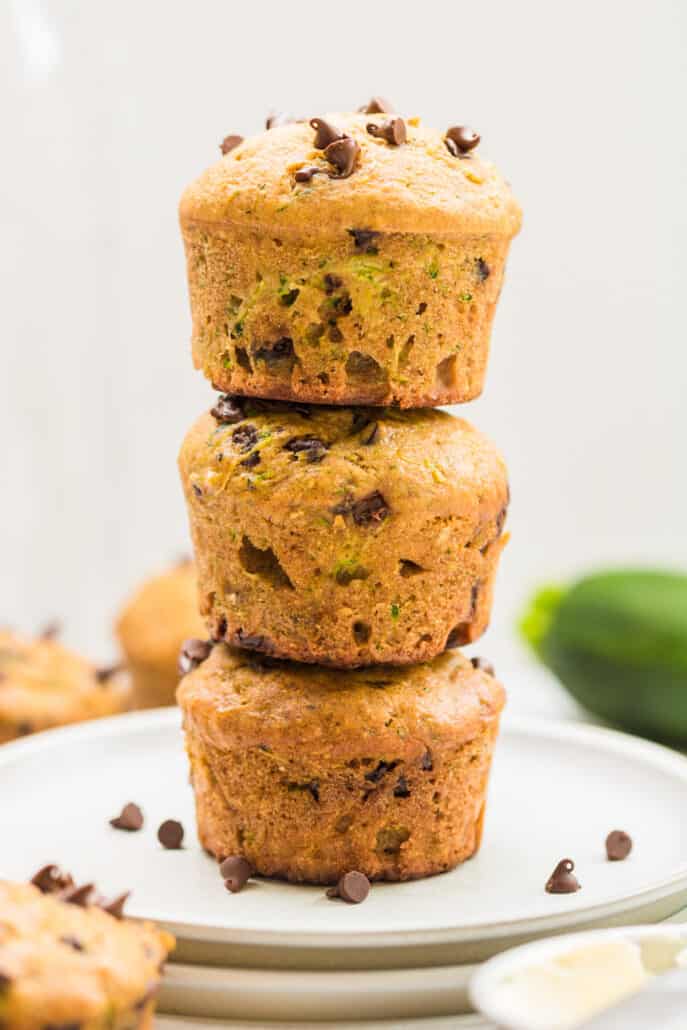 Chocolate Chip Zucchini Muffins stacked on a plate