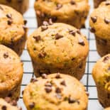 Chocolate Chip Zucchini Muffins on a cooling rack.
