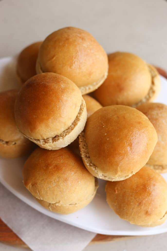 Bread machine hamburger buns on a white platter