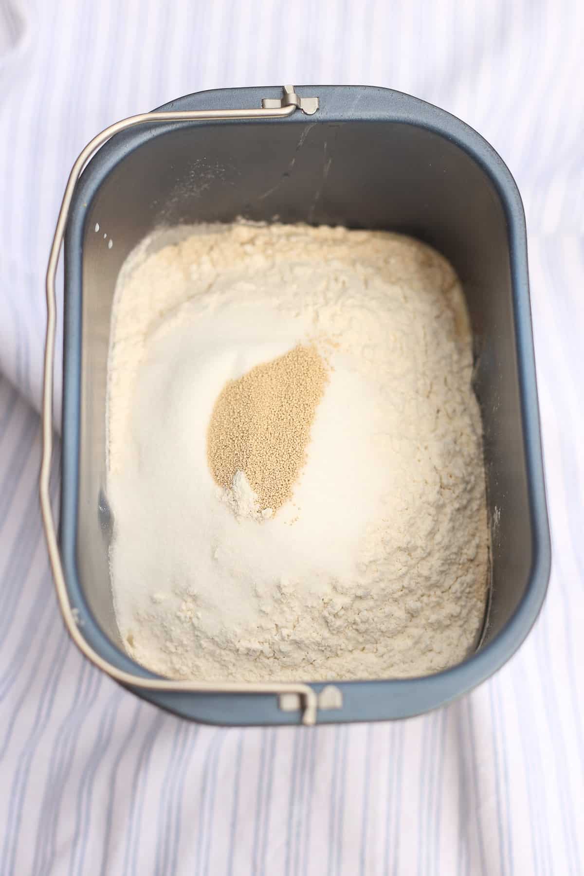Ingredients for hamburger buns in a bread machine.