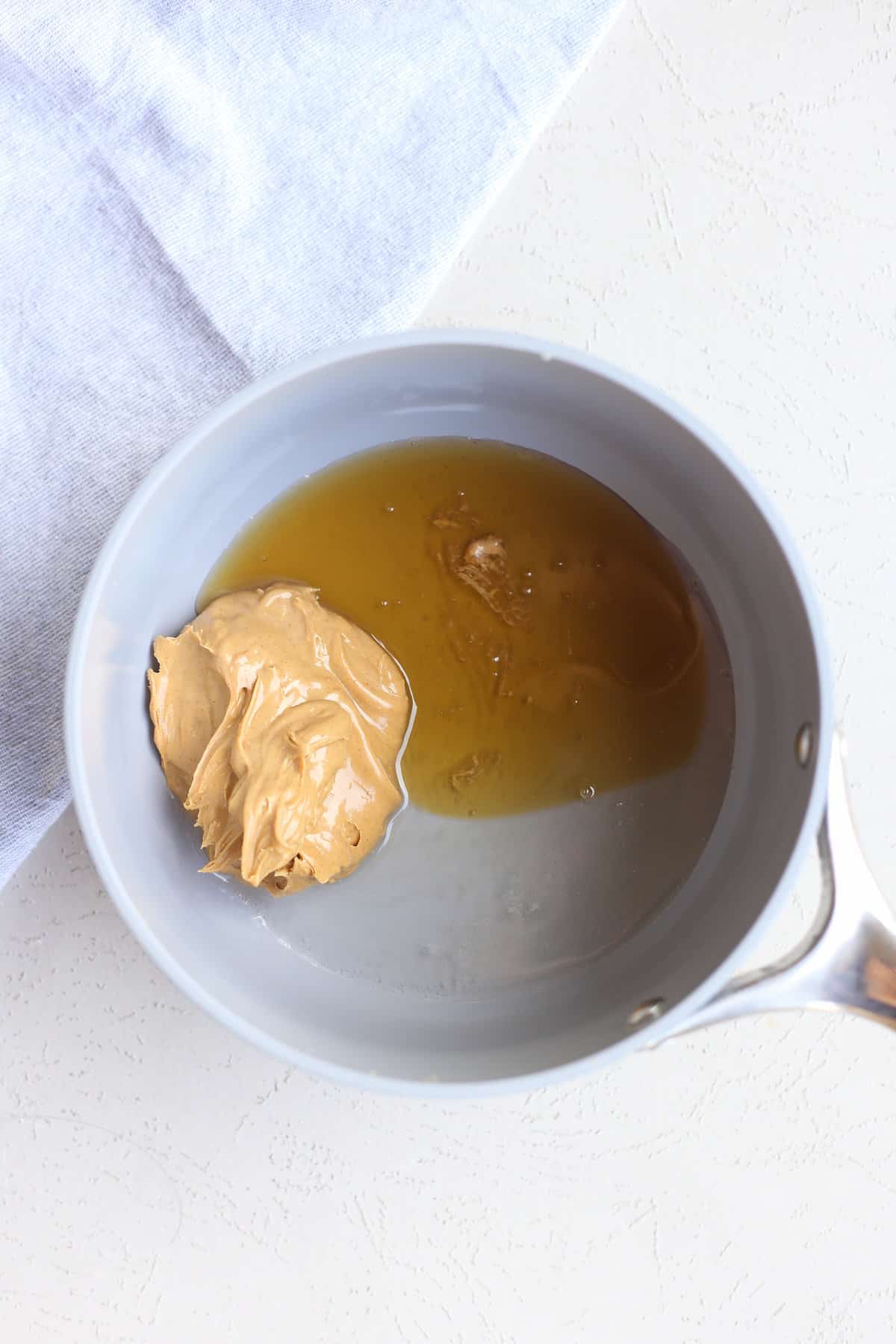 peanut butter, honey, and coconut oil in a pot