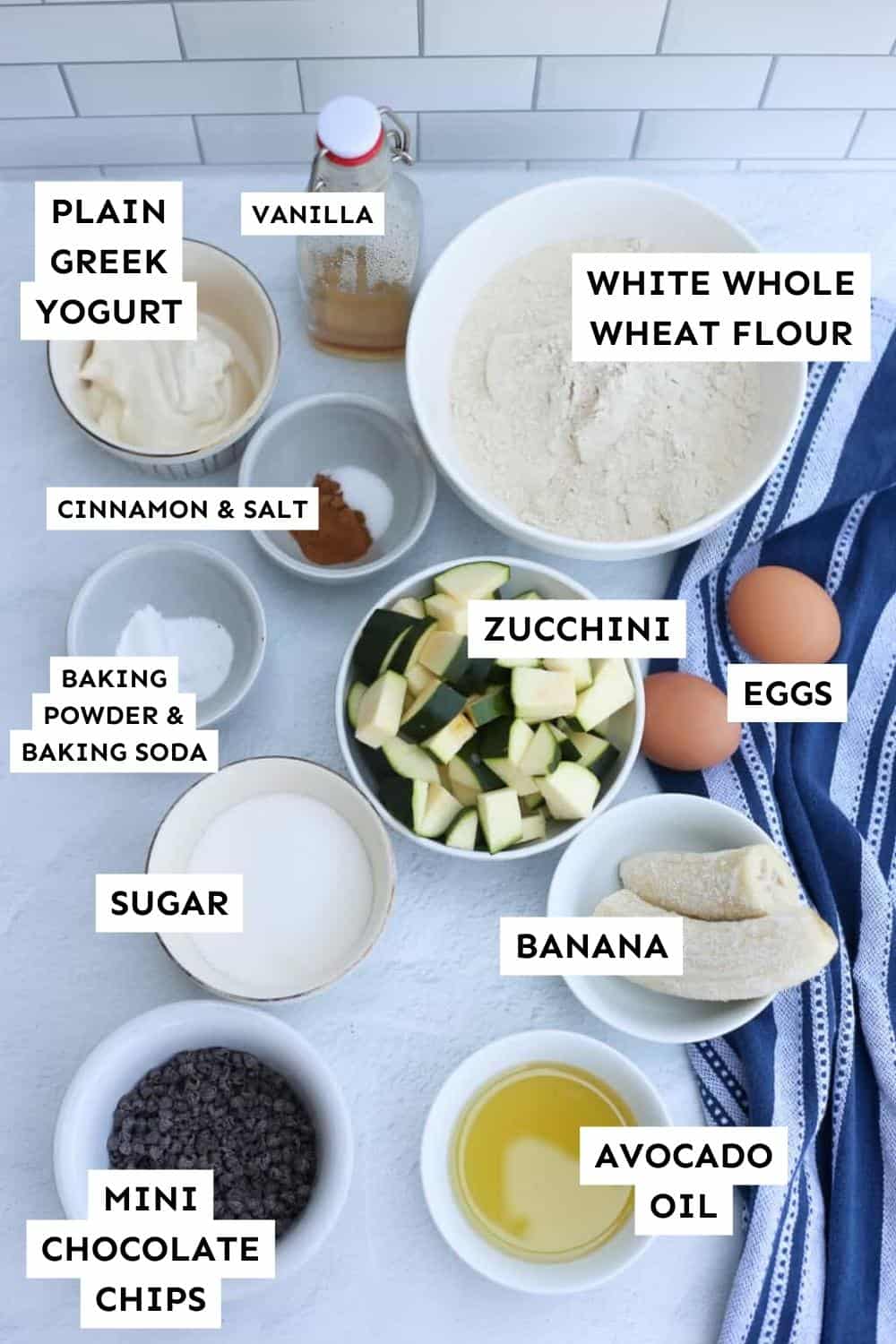 Zucchini Breakfast Cake Ingredients laid out and labeled.
