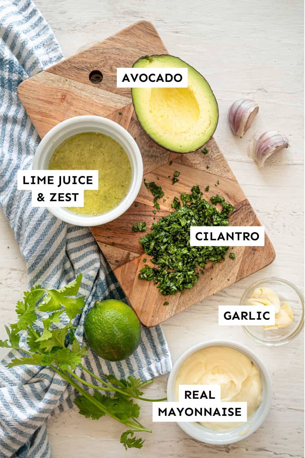 Cilantro Lime Aioli ingredients laid out on a cutting board.