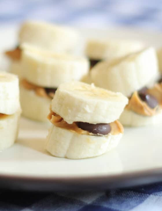 Banana bite with peanut butter and dark chocolate in the middle.