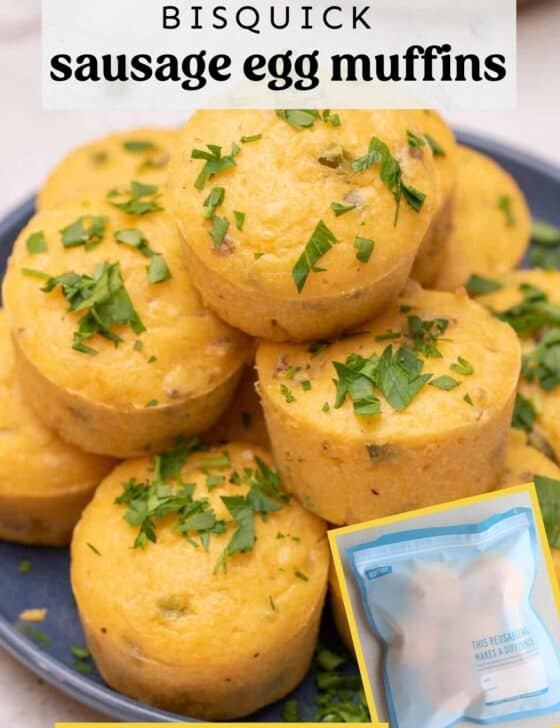 yellow savory breakfast muffins with parsley sprinkled on top.