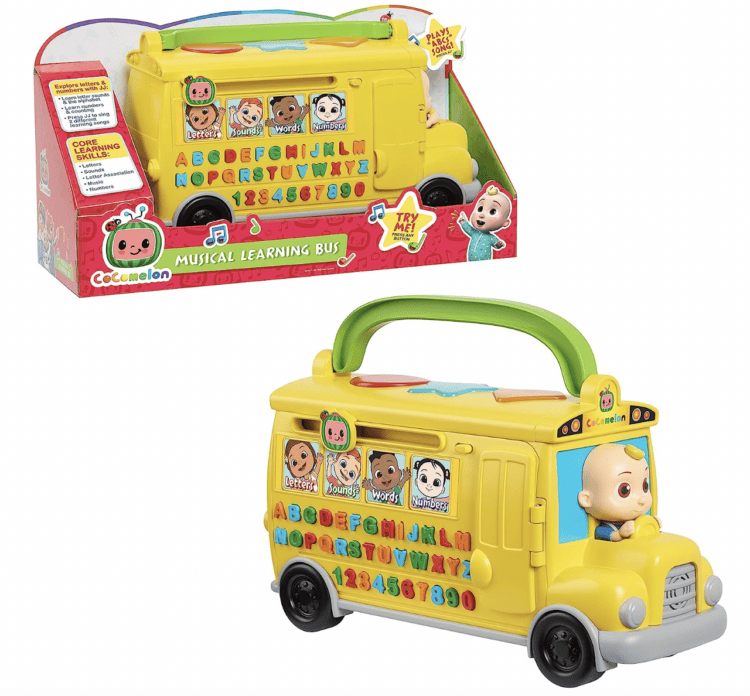 Stock photo of a CoComelon Musical Learning Bus - plastic yellow school bus toy with letter buttons and a green handle.