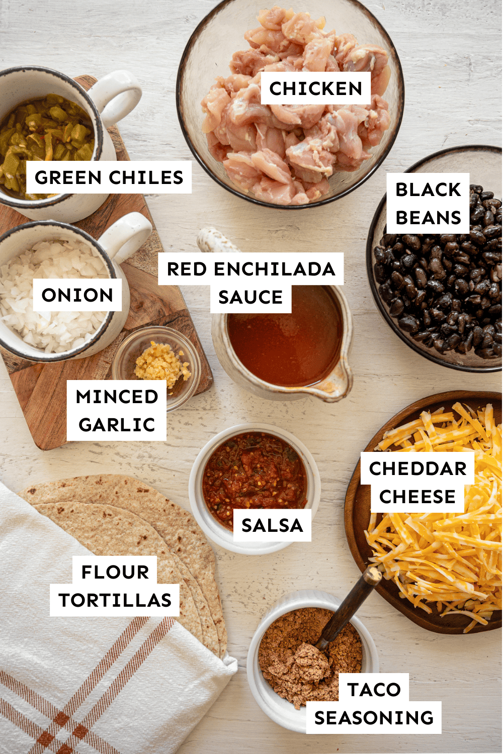 Cheesy Chicken Enchilada  Ingredients measured out on a counter and labeled.