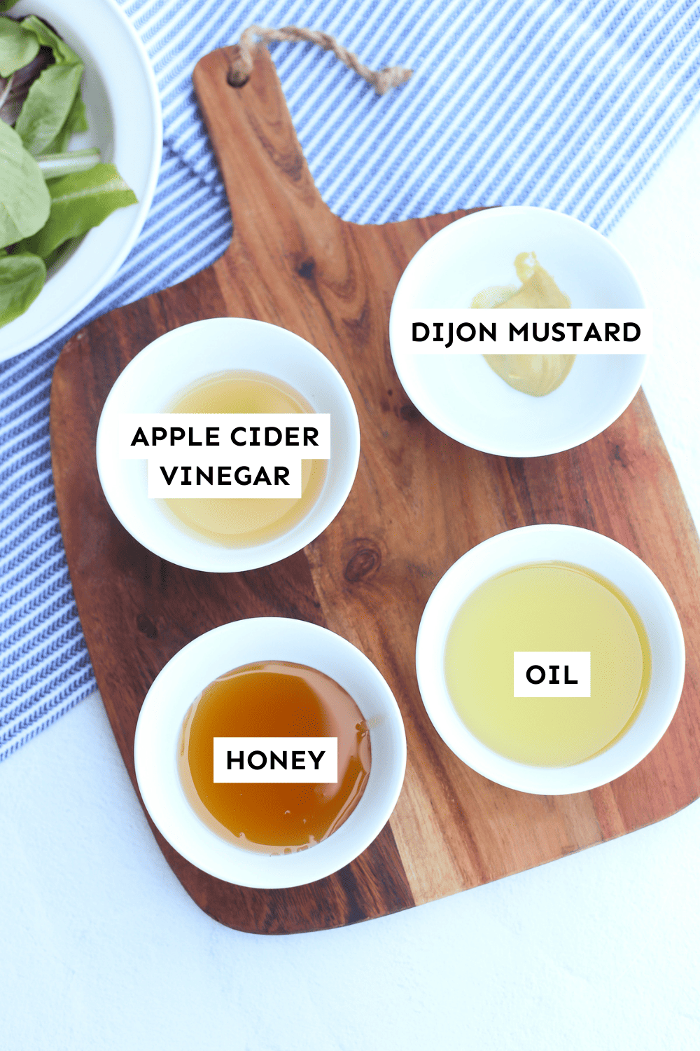 Labeled ingredients for honey dijon salad dressing. 