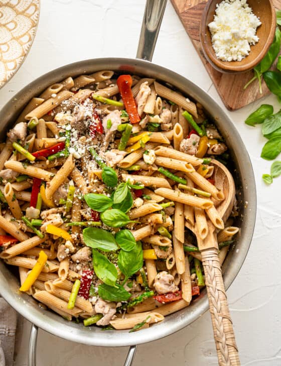 Skillet with Chicken Penne Pasta with Asparagus and Peppers ready to be served.