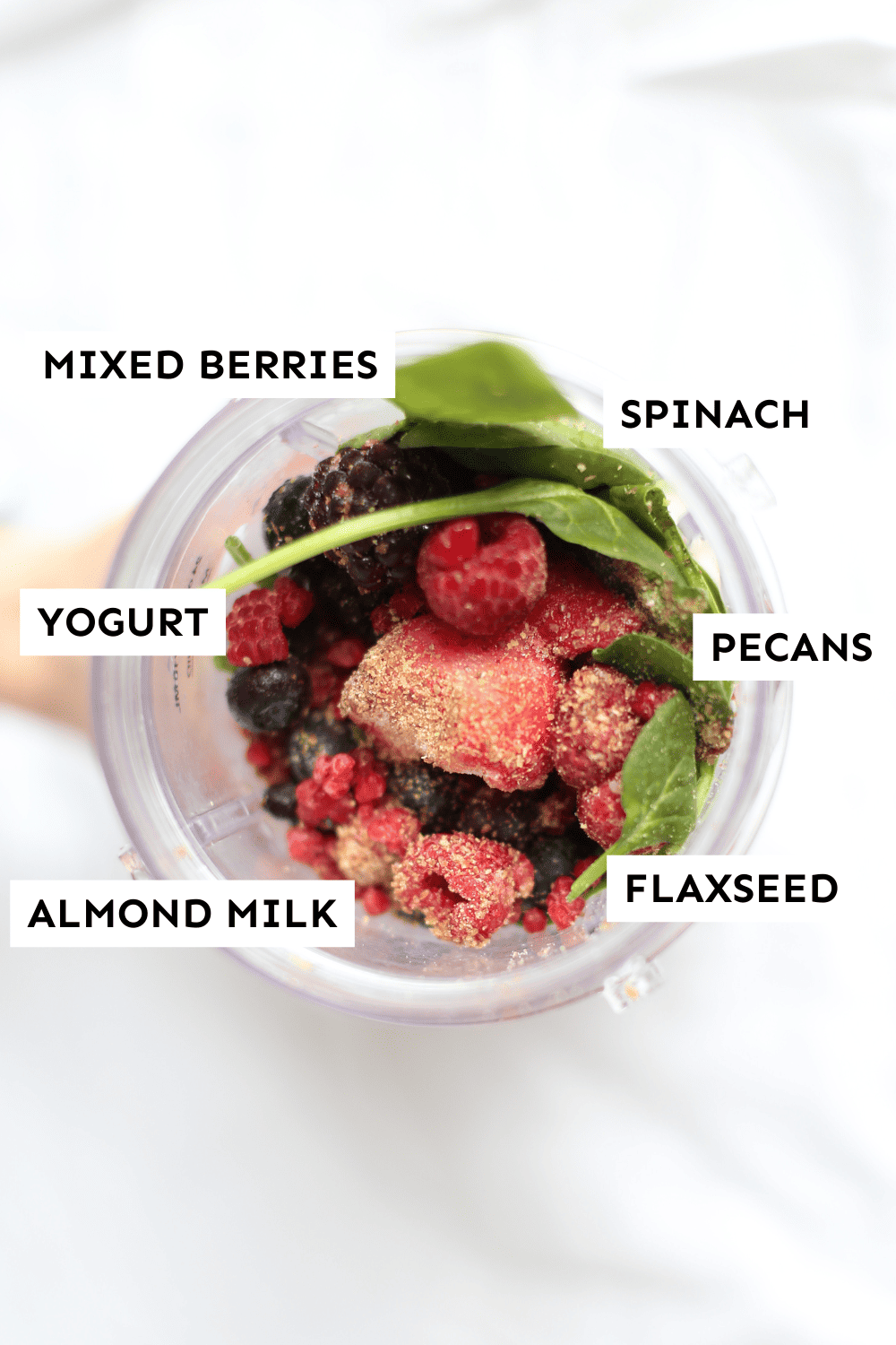 Labeled ingredients for a berry smoothie. 