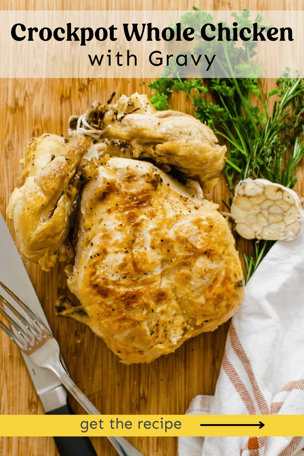A whole roasted chicken on a wooden cutting board ready to be carved.