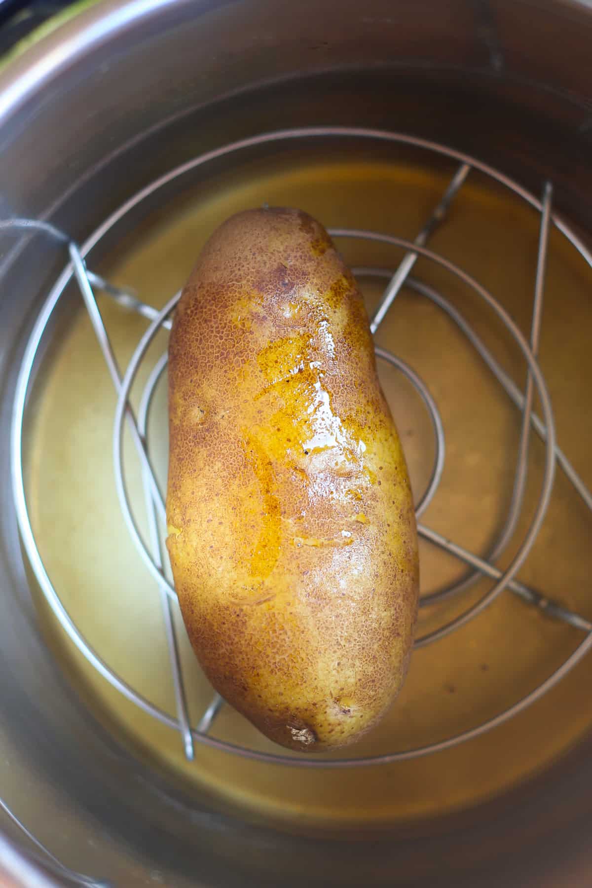A fully cooked potato in the Instant Pot. 