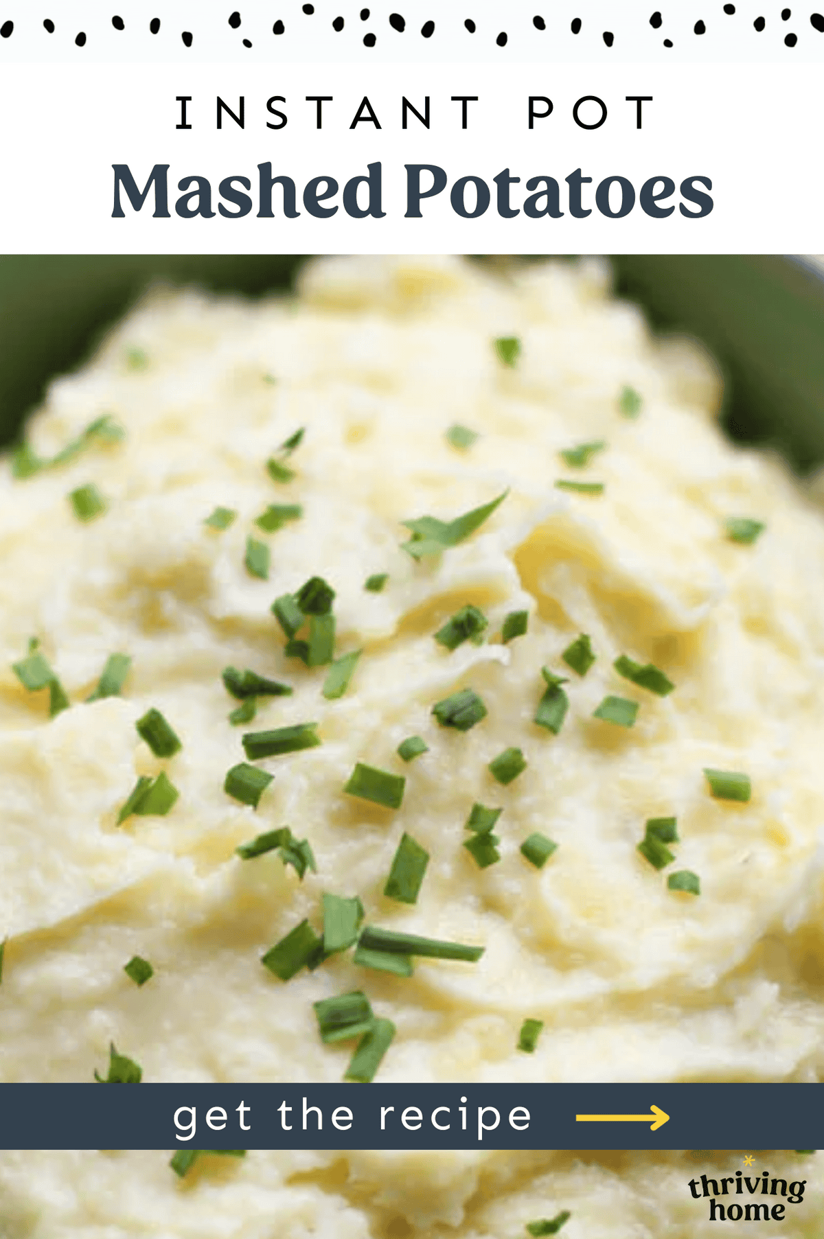 Creamy mashed potatoes with chopped chives on top.
