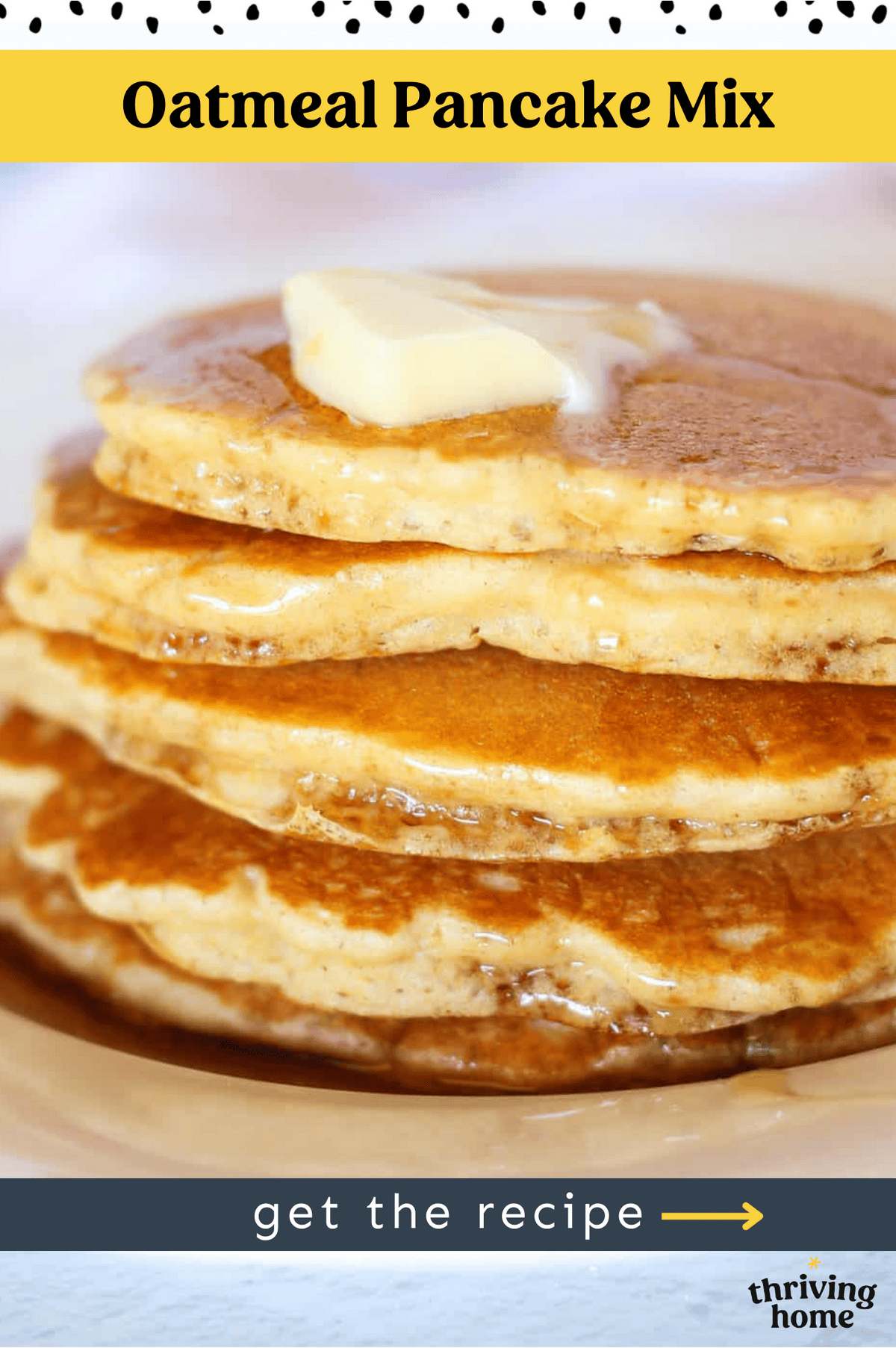 A stack of oatmeal pancakes served with butter and maple syrup.