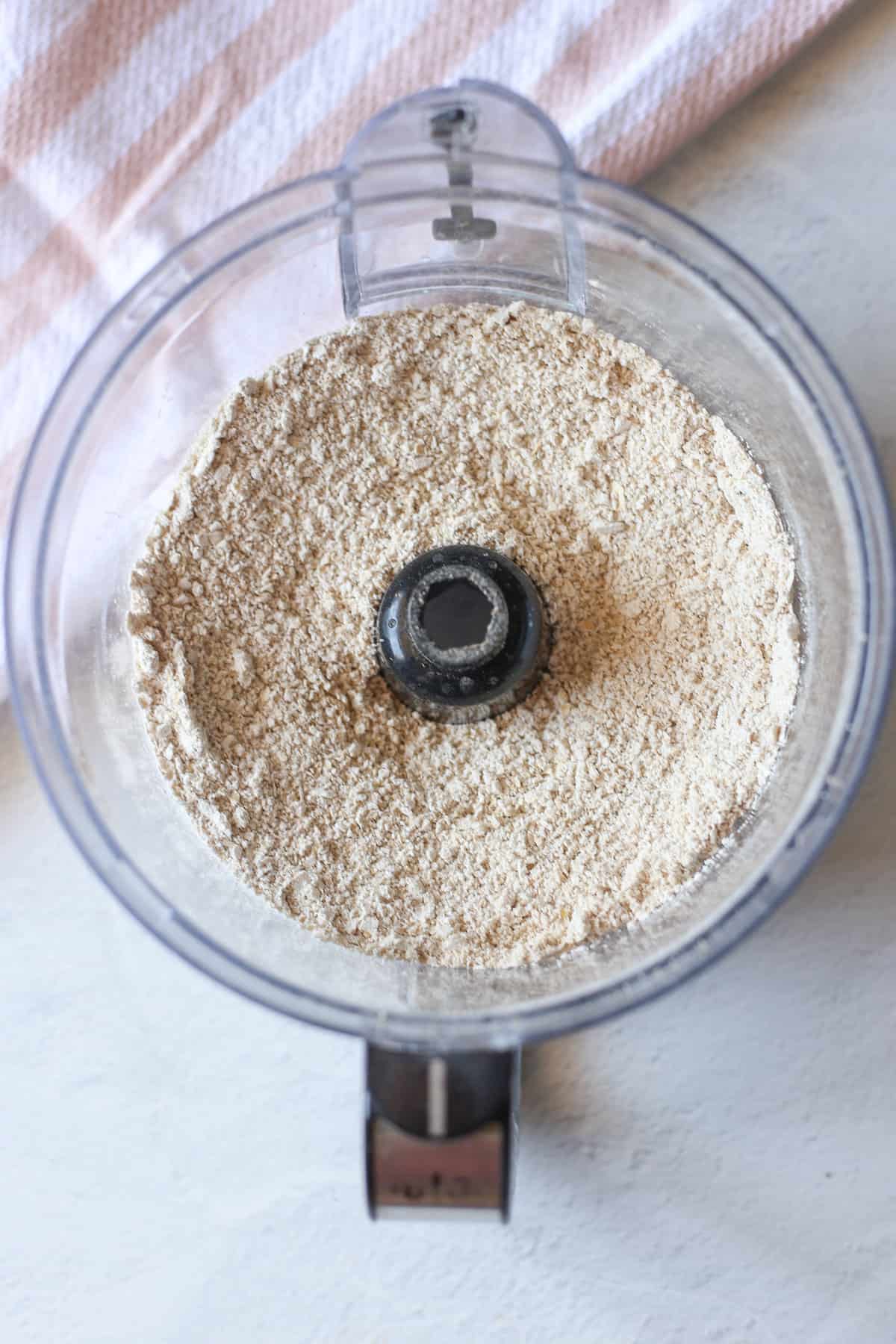 Oats that have been ground up in a food processor. 