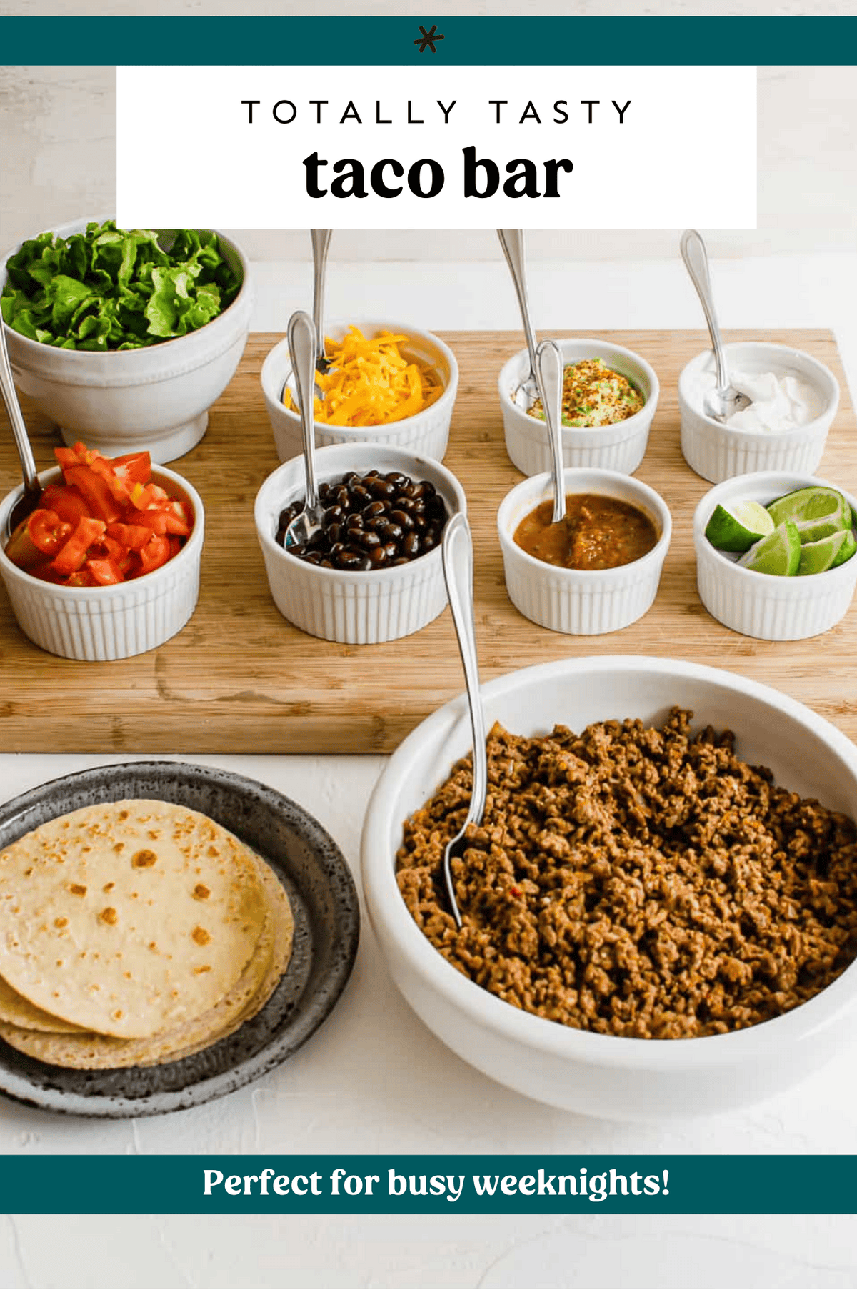 Taco meat, shells, and toppings laid out for a taco bar.