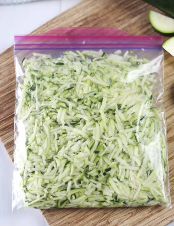 A bag of shredded zucchini prepped for the freezer.