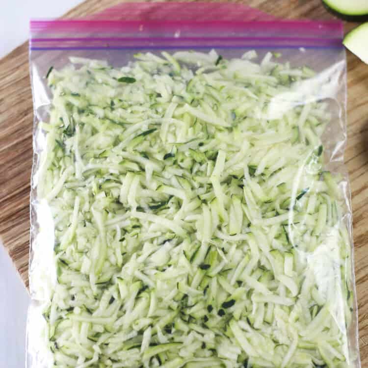 A bag of shredded zucchini prepped for the freezer.