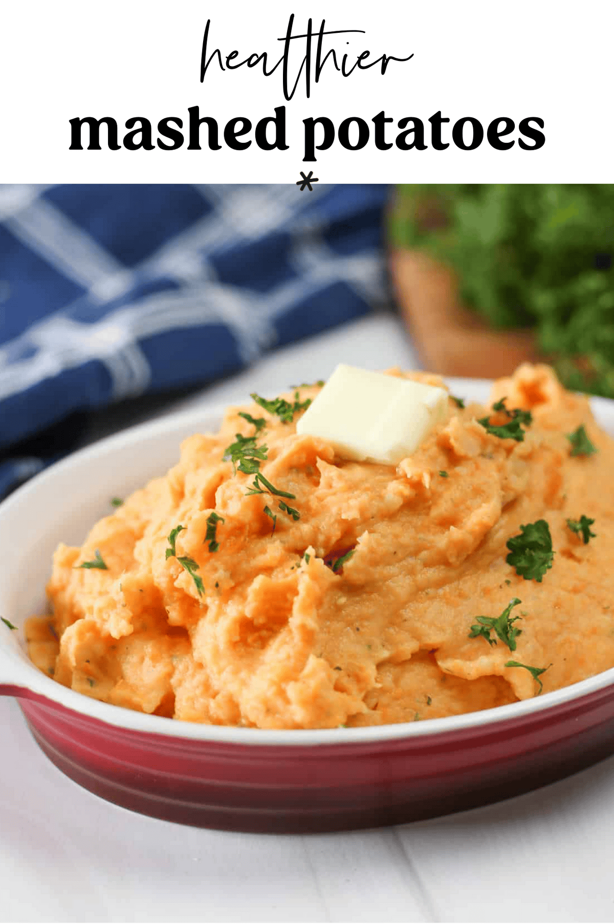 A bowl of orange mashed potatoes because of the sweet potato mixed in.