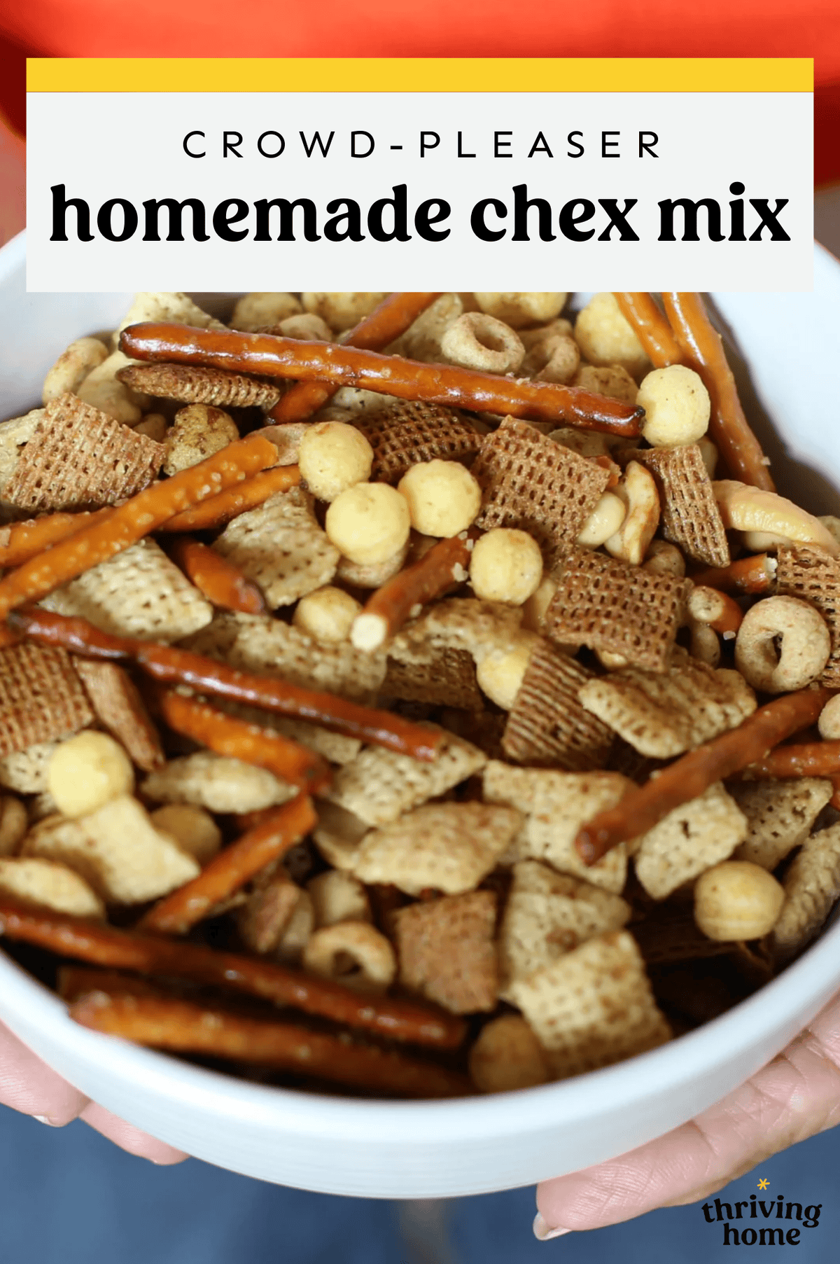 Homemade Chex Mix in a white bowl.