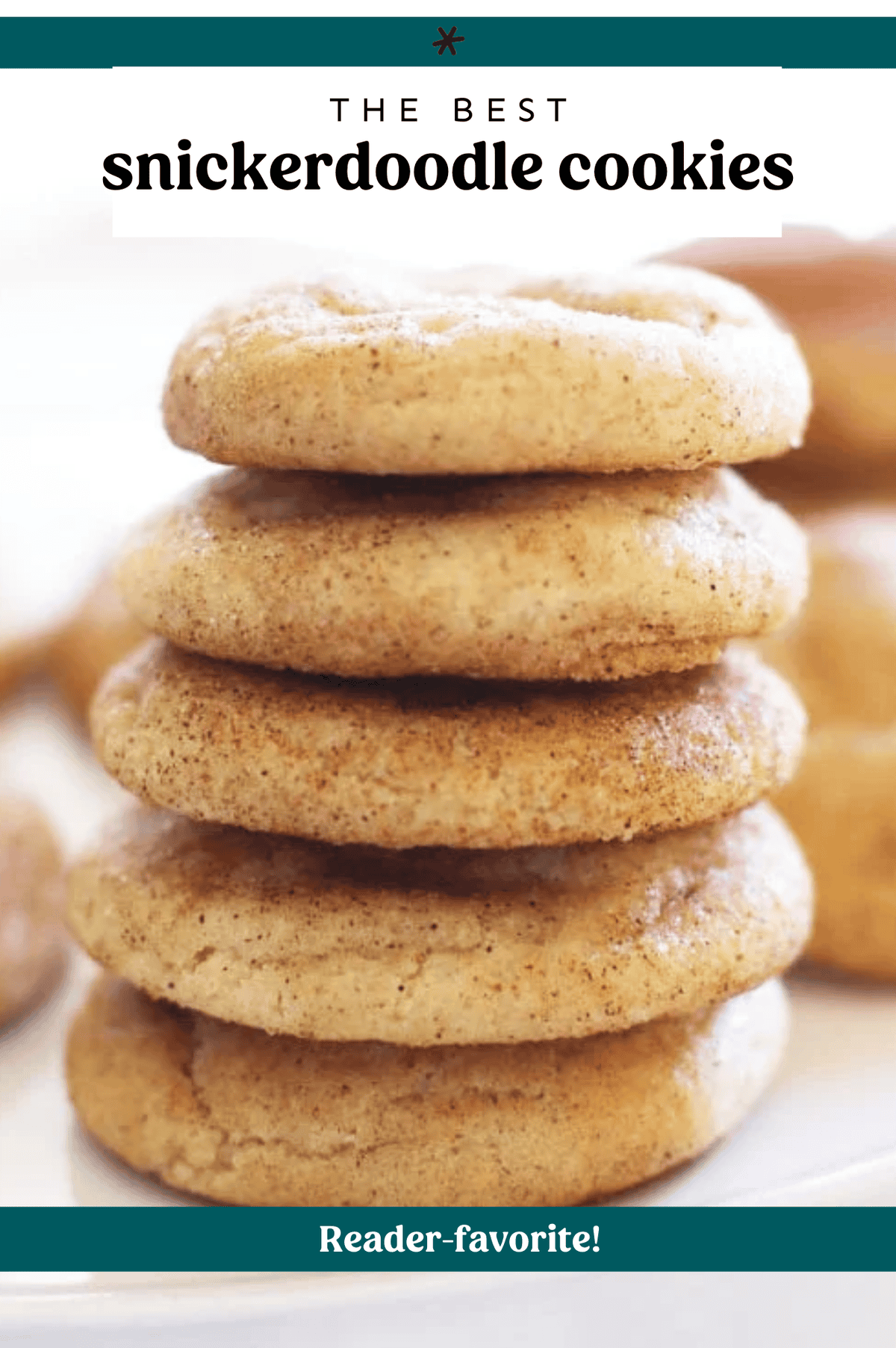 Snickerdoodle cookies stacked up on a counter.