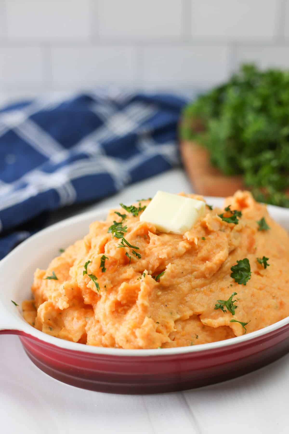 Healthy mashed potatoes with parsley on top. 