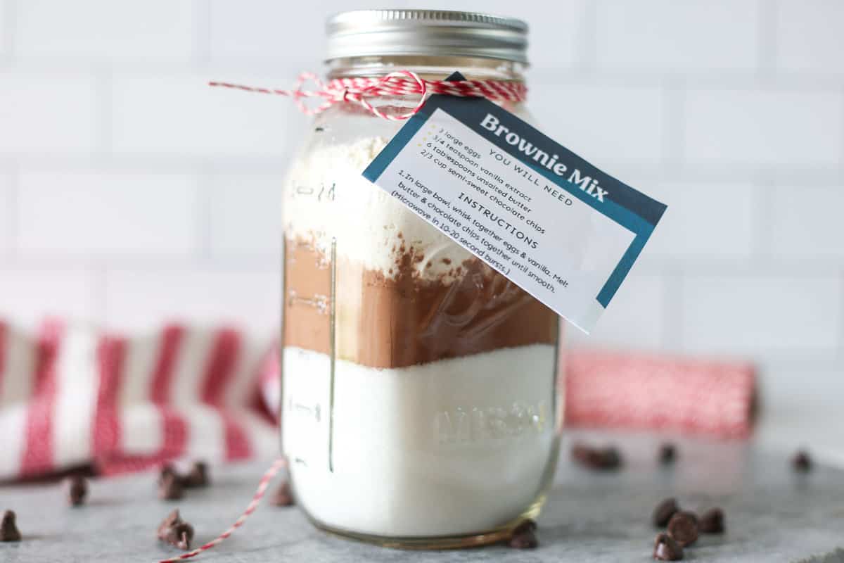 Homemade brownie mix in a mason jar with tag.