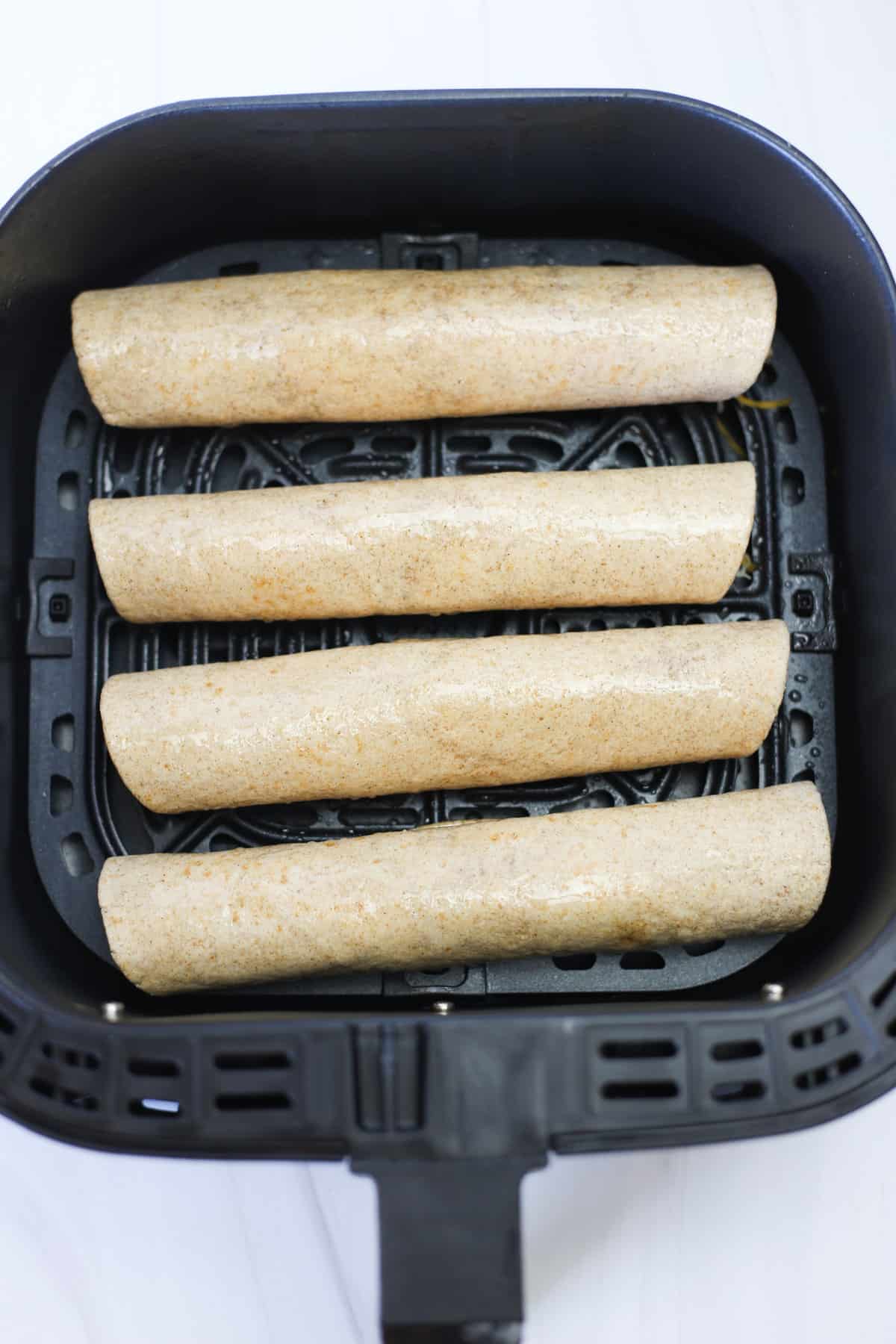 Taquitos prepped and ready for the air fryer.