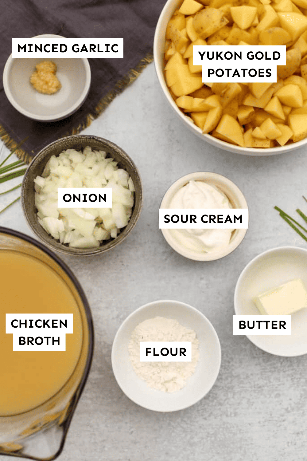 Instant Pot potato soup ingredients measured out and labeled.