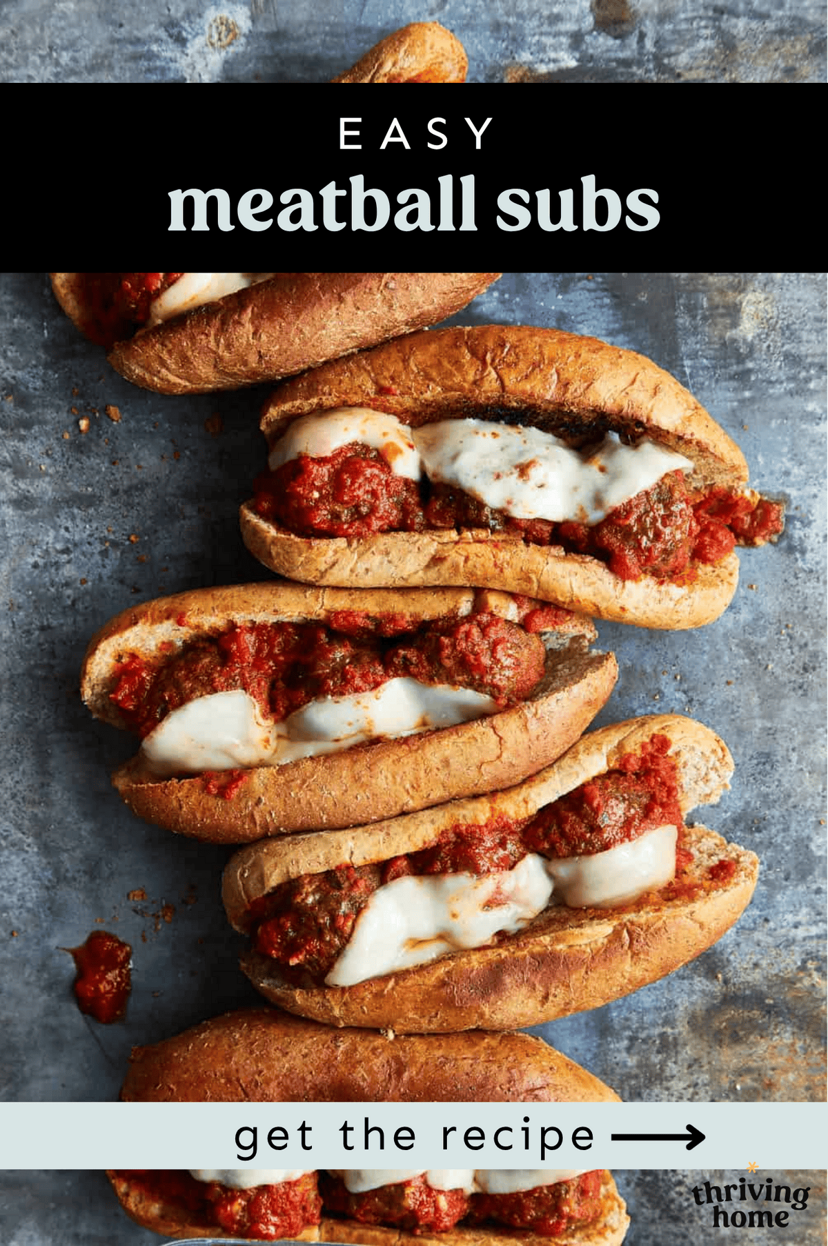 Meatball sub sandwiches in a row.
