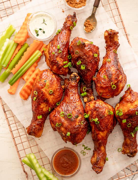 BBQ chicken drumsticks served with crinkle cut celery and carrots.