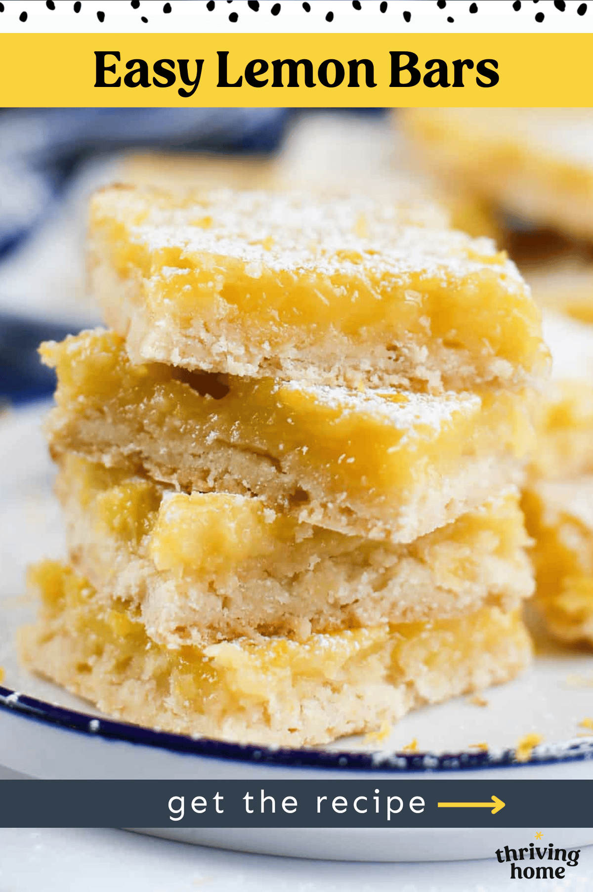 Four lemon bars stacked on a white plate sprinkled with powdered sugar.