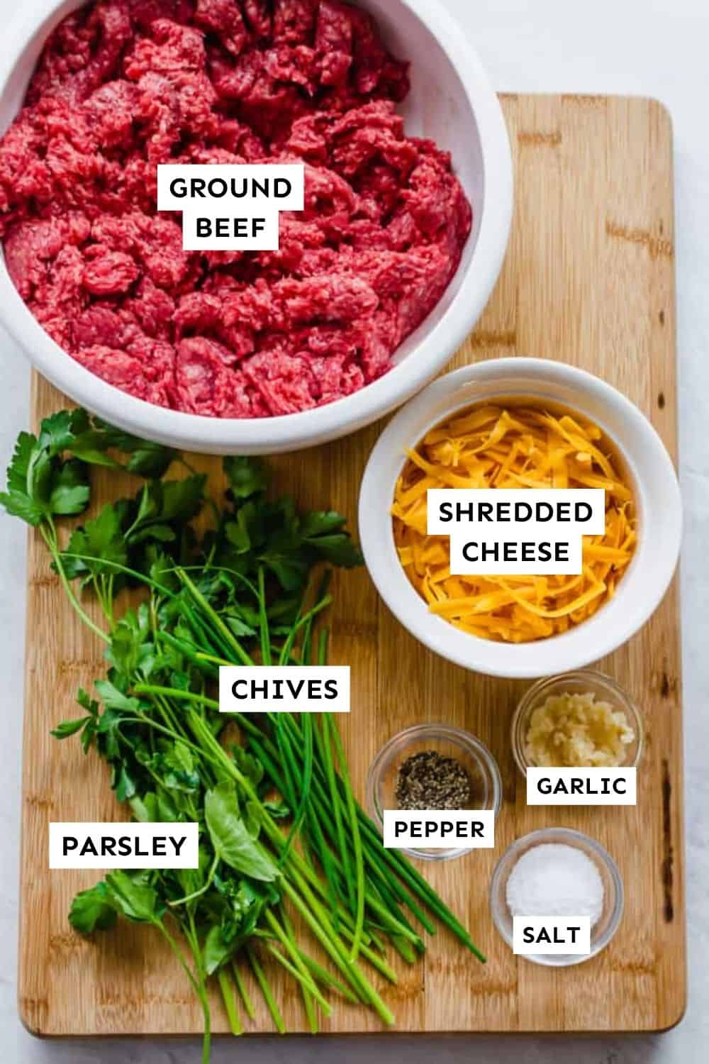Cheesy chive burger ingredients measured out and labeled.