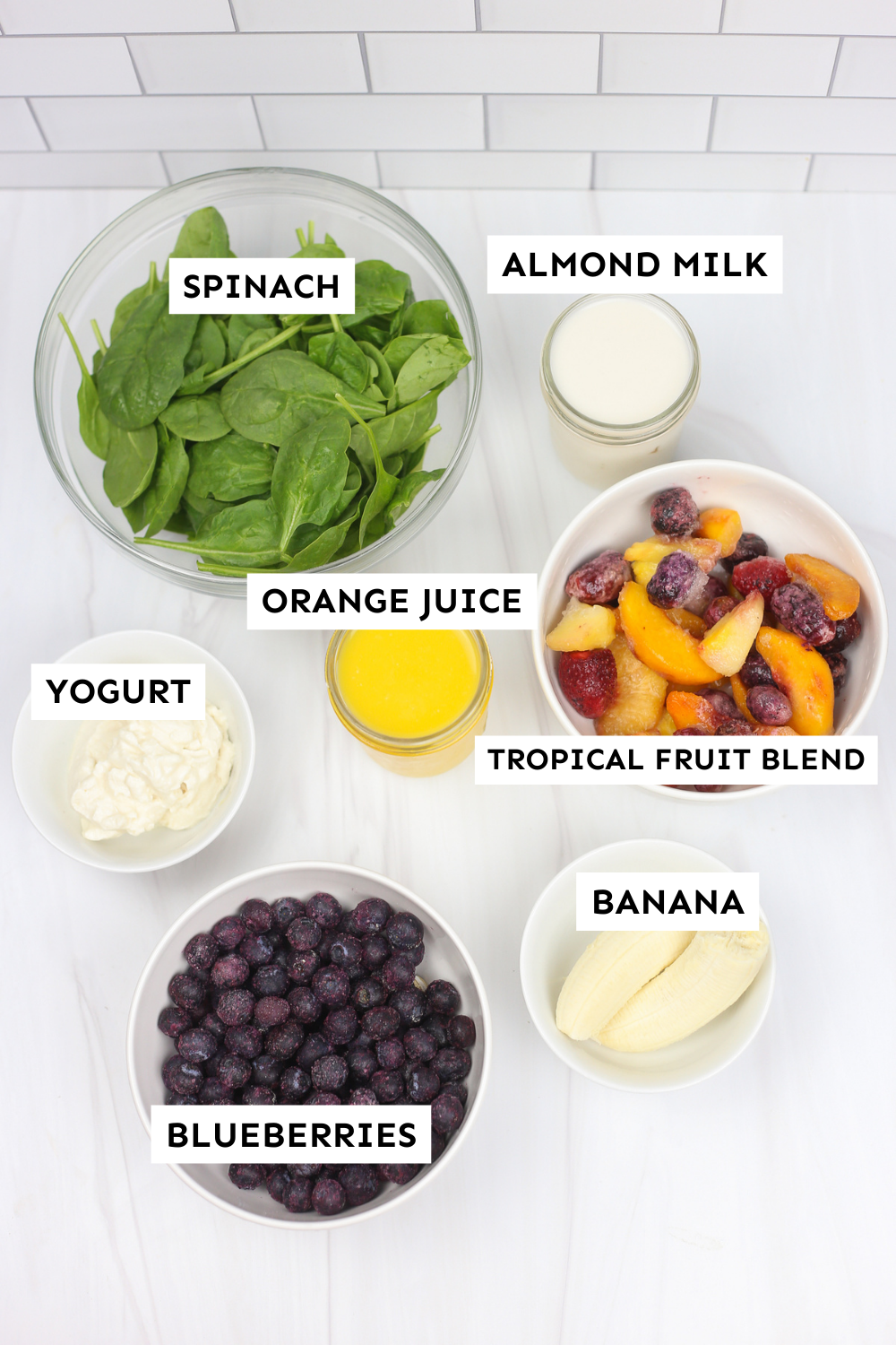 Labeled ingredients for Thriving Home's Everyday Smoothie recipe.