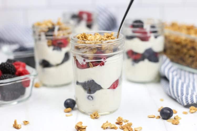 Make ahead yogurt parfaits in small mason jars topped with granola.