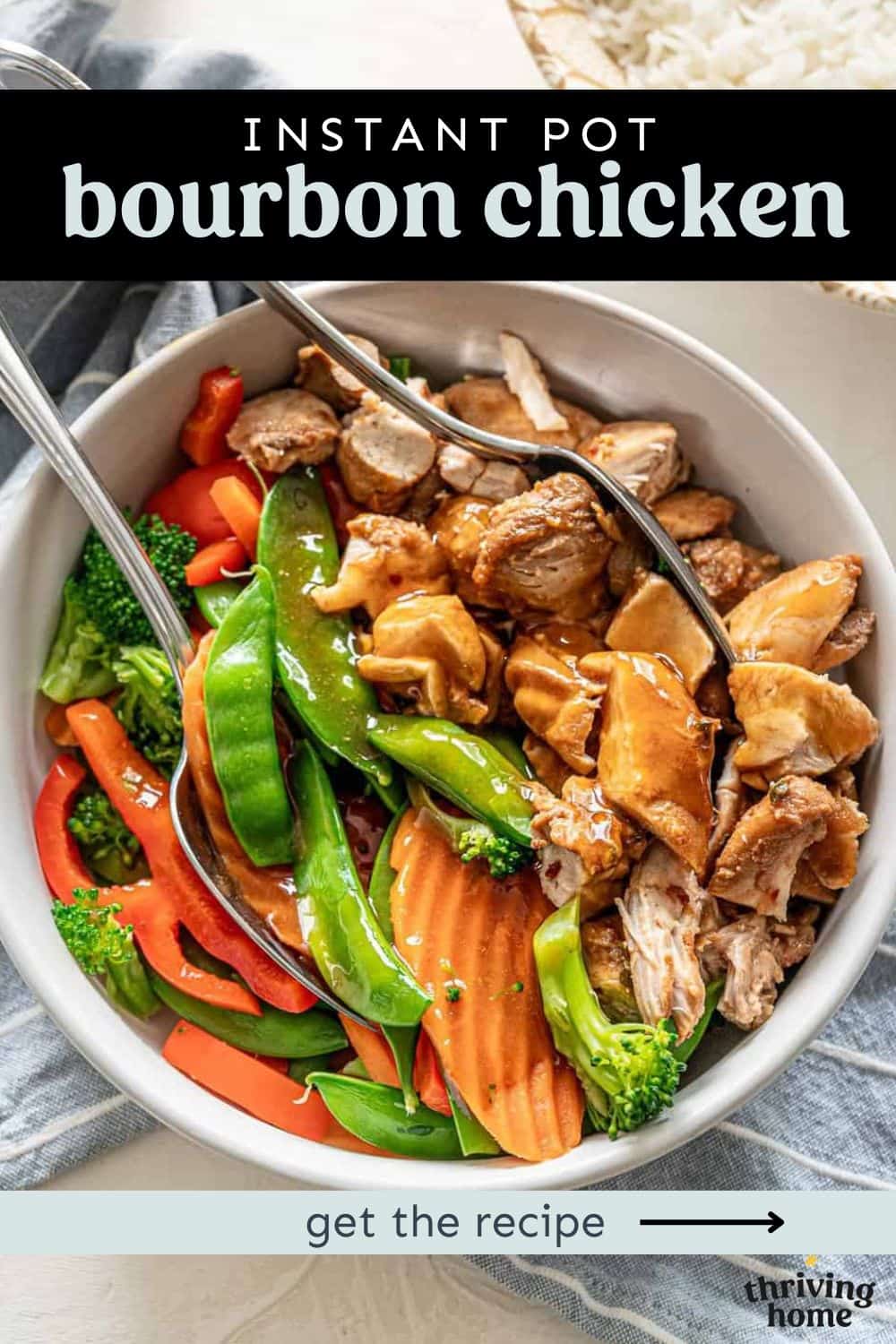 bowl of chicken and stir fry veggies with bourbon sauce top.