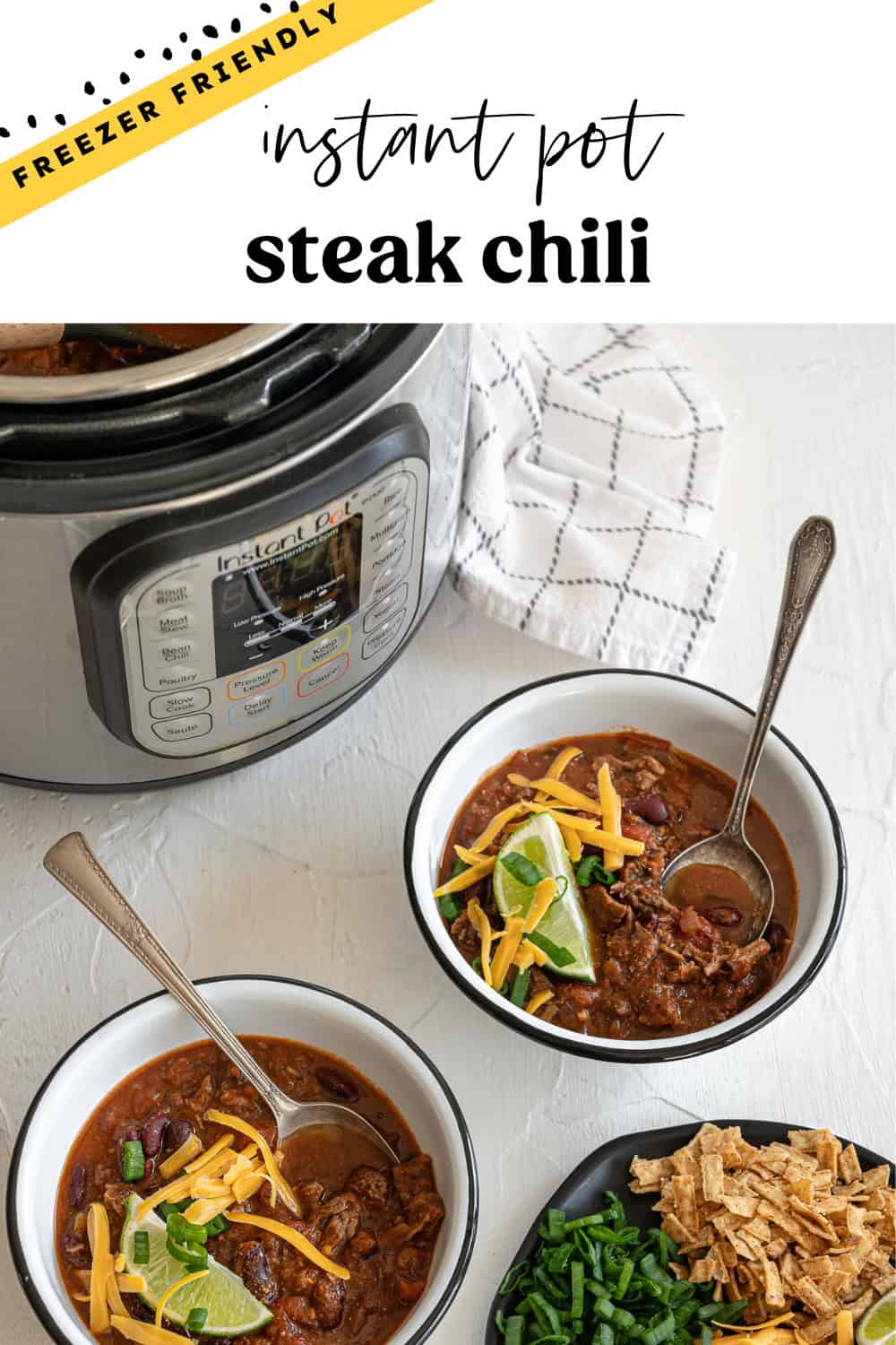 Two bowls of steak chili in front of an Instant Pot.