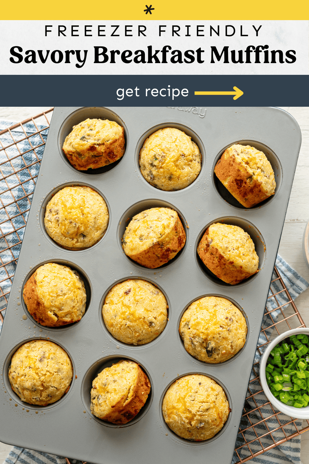 Savory breakfast muffins in a muffin pan with most of them turned sideways to cool.