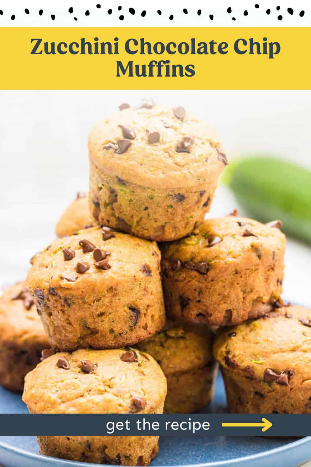 Zucchini chocolate chip muffins stacked on a plate.