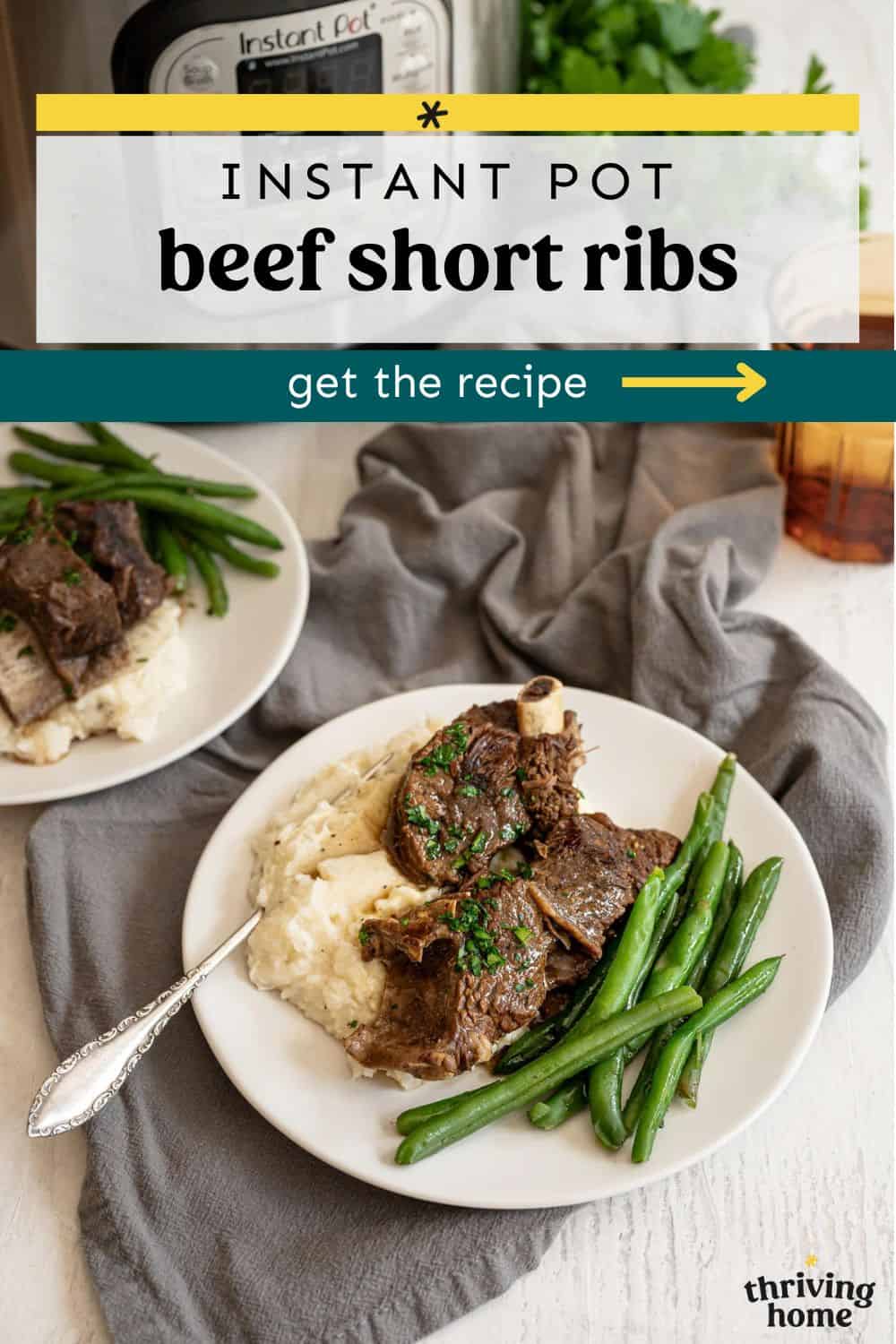 Instant pot beef short ribs on white plates over mashed potatoes with green beans on the side.