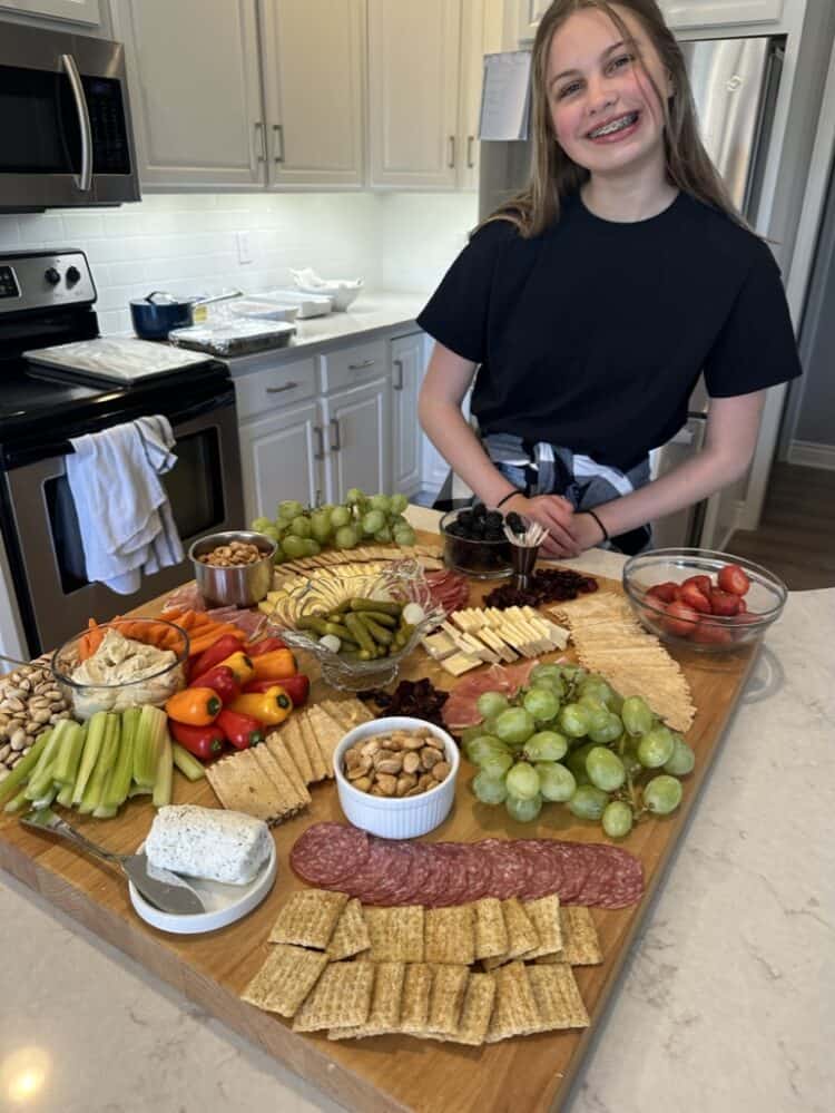 Girl with charcuterie board