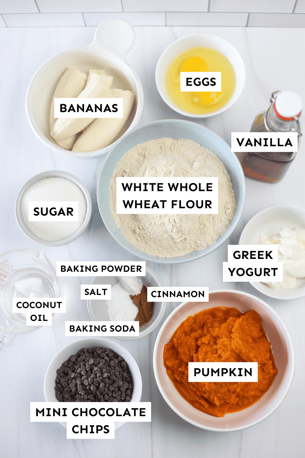 Banana breakfast cake ingredients measured out and labeled.