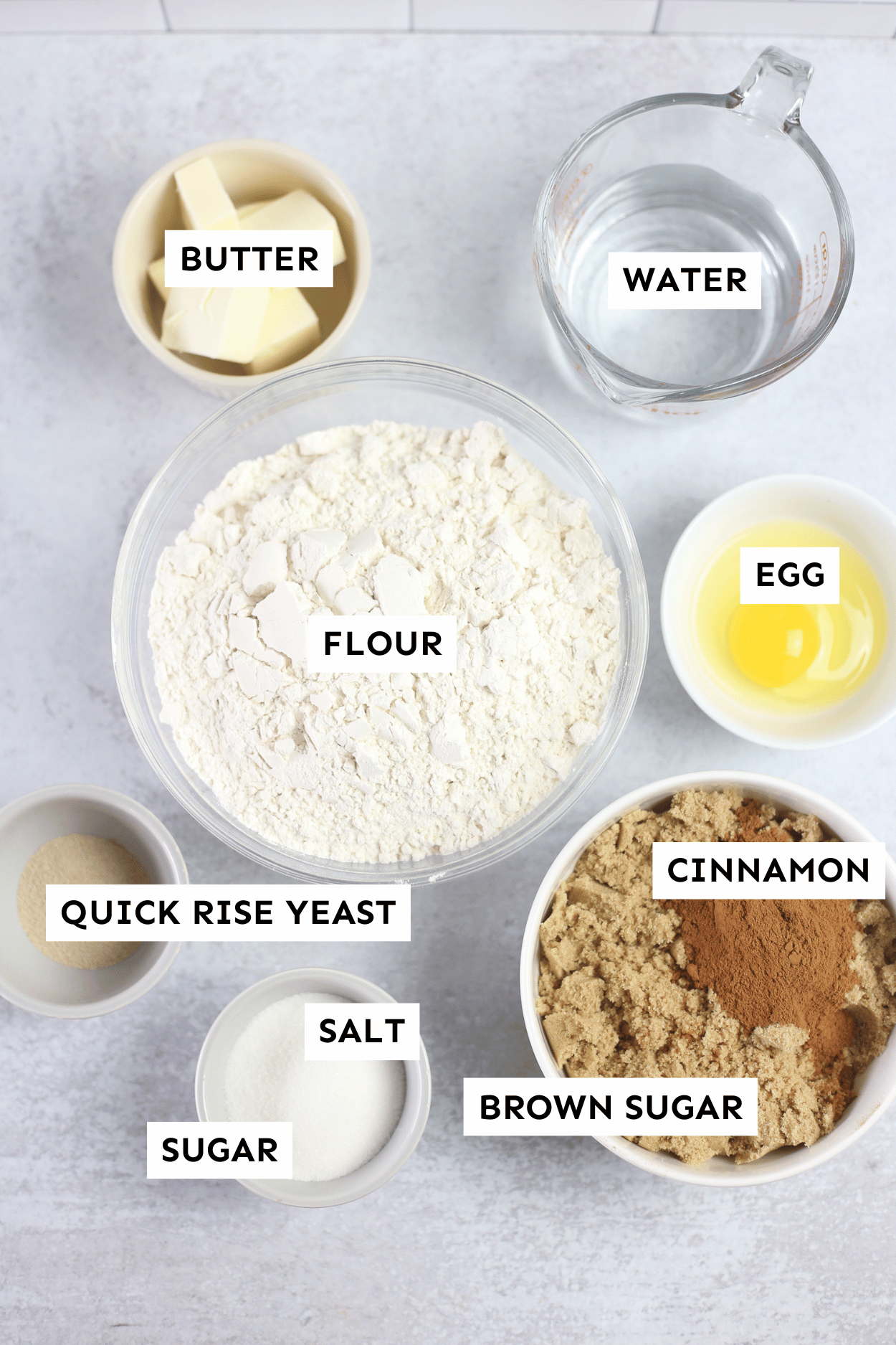 Labeled ingredients for bread machine cinnamon rolls. 