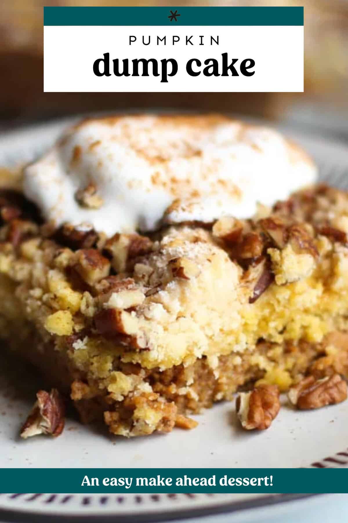 A serving of pumpkin dump cake with a dollop of maple whipped cream on top.