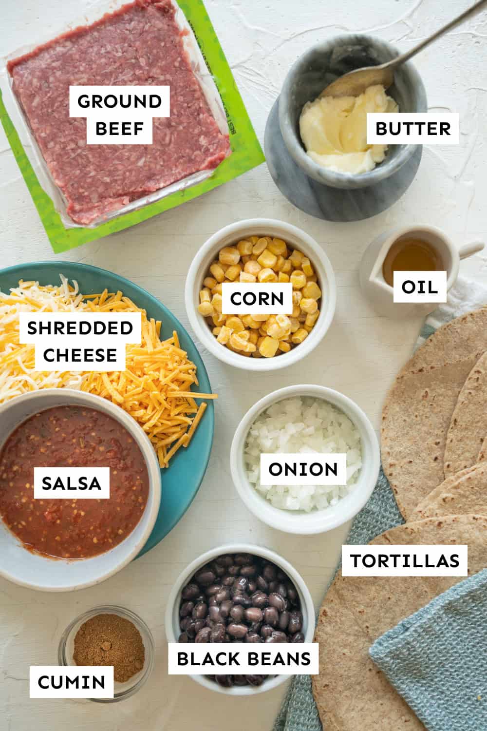 Ground beef quesadilla ingredients measured out and labeled.