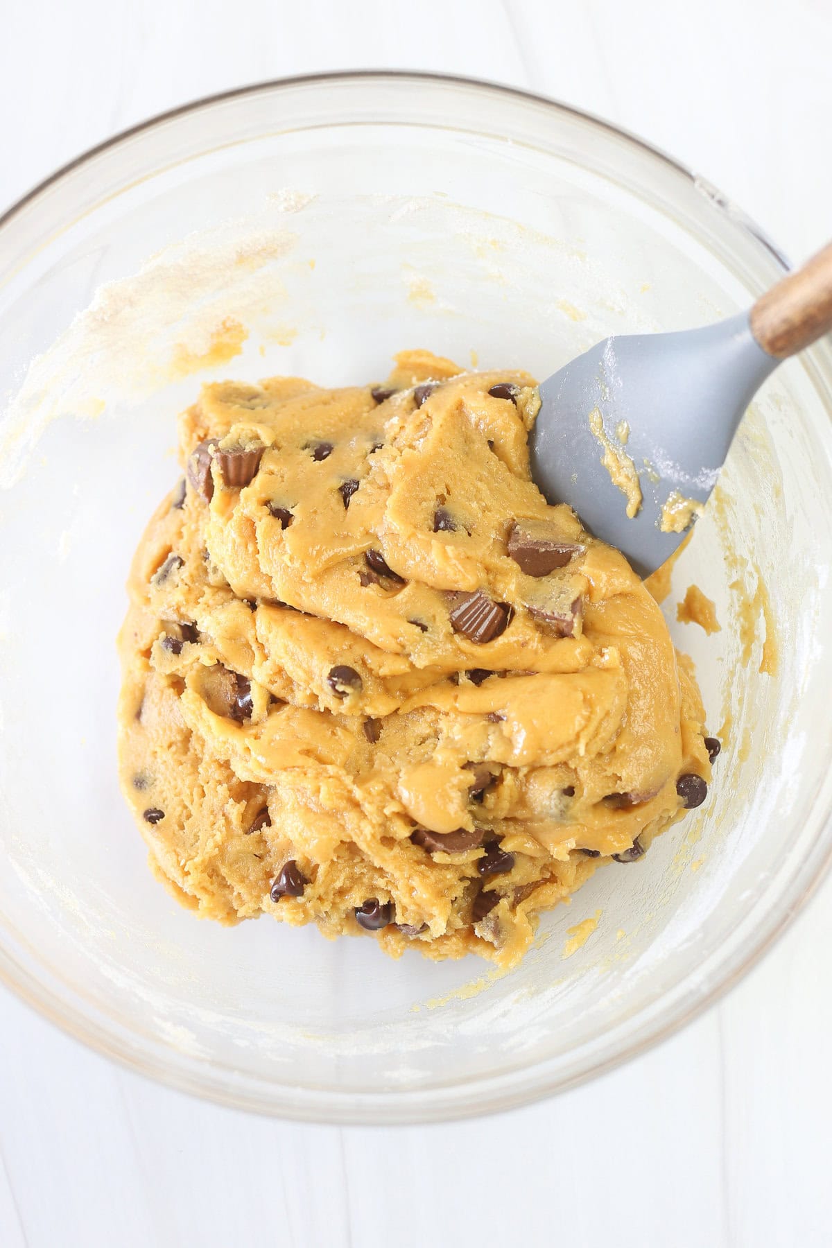 Peanut butter cup cake mix cookie batter in a mixing bowl.