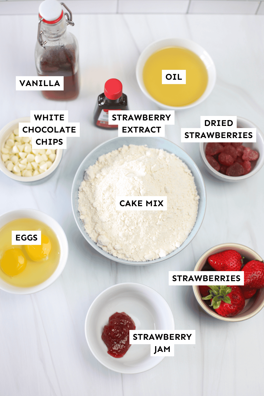 Strawberry cake mix cookie ingredients measured out and labeled.