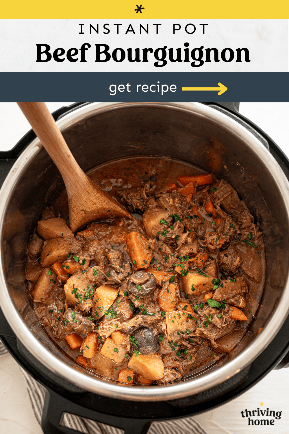 Rustic French stew called Beef Bourguignon in the Instant Pot with a wooden spoon.