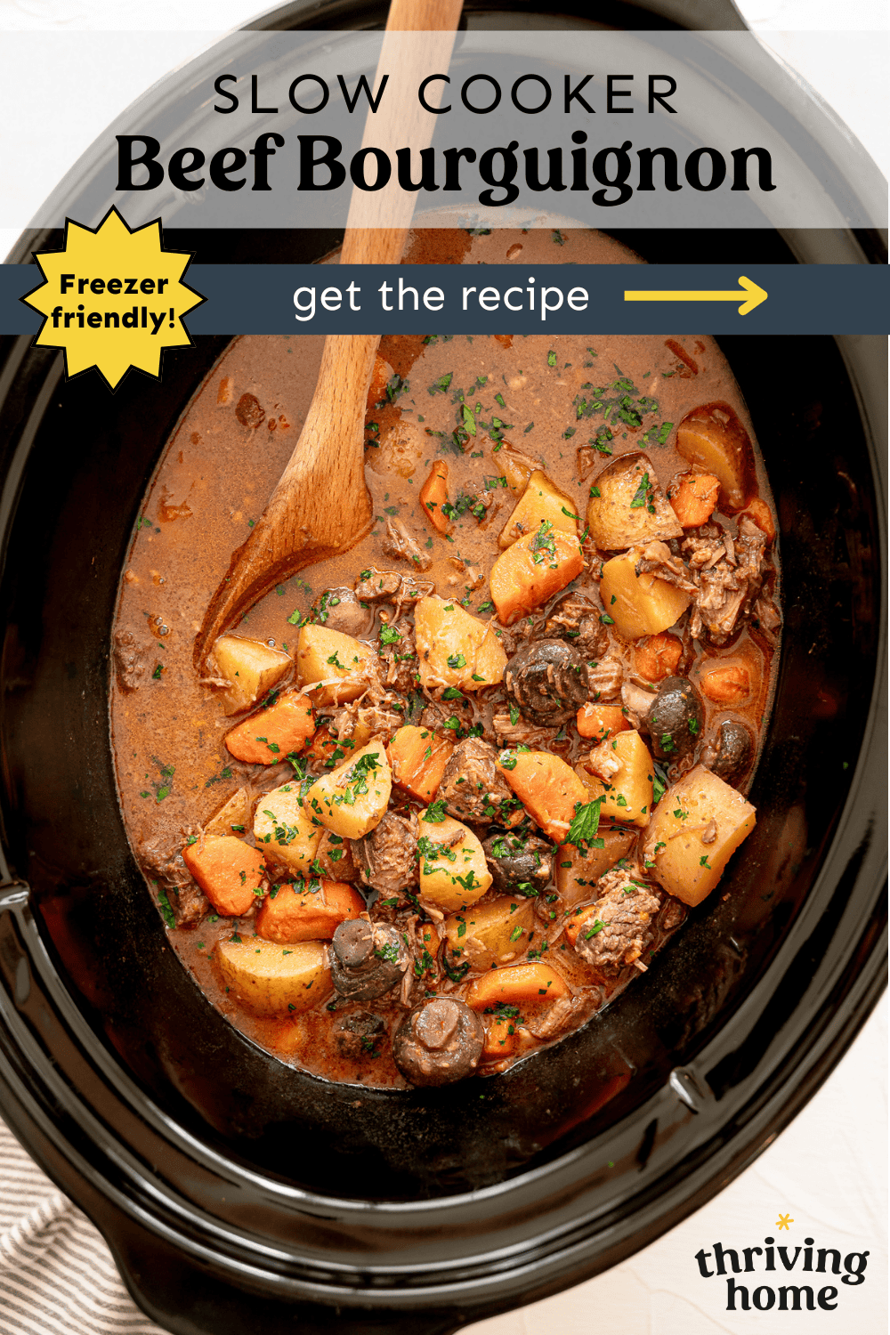 Beef bourguignon in a crock pot ready to serve.